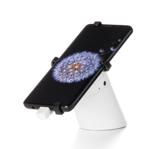 휴대폰이 OnePOD 위에 놓여 있다